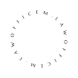Circular text logo on black background.